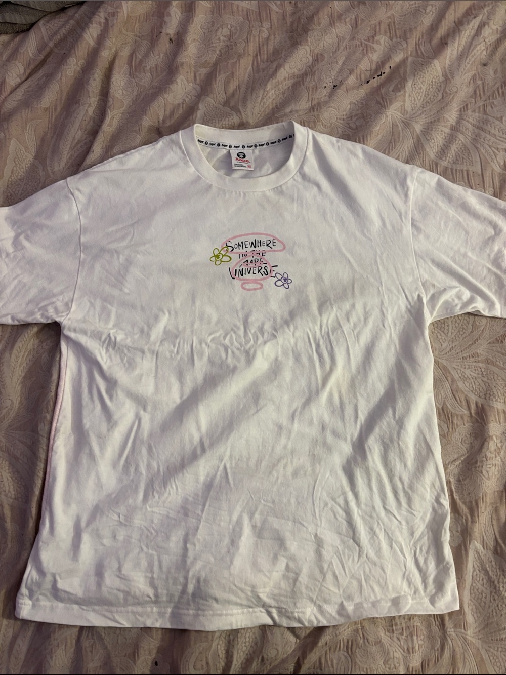 Bape White Graphic Tee with Pastel Flower Chest Print